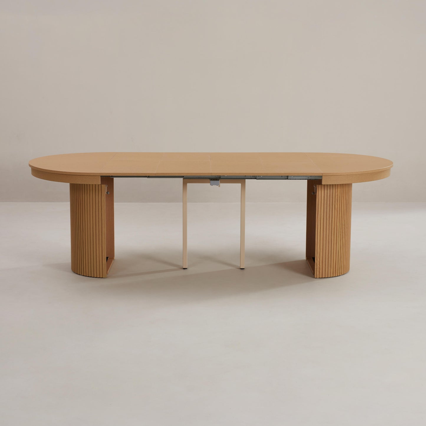 Extending fluted oval table in pecan wood