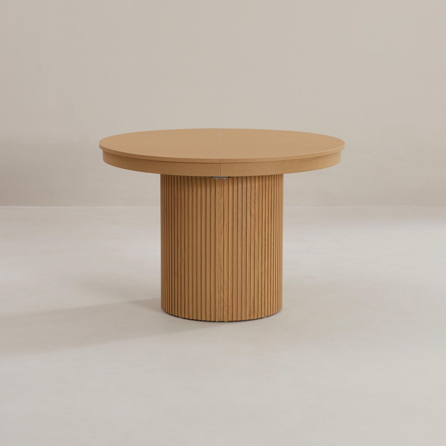Corinthian round to oval extending table