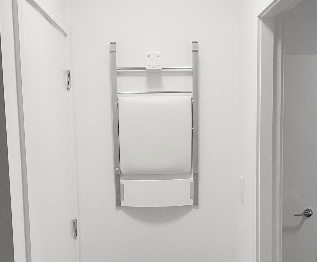 Really strong folding hook on a wall holding 2 nano chairs | Universal