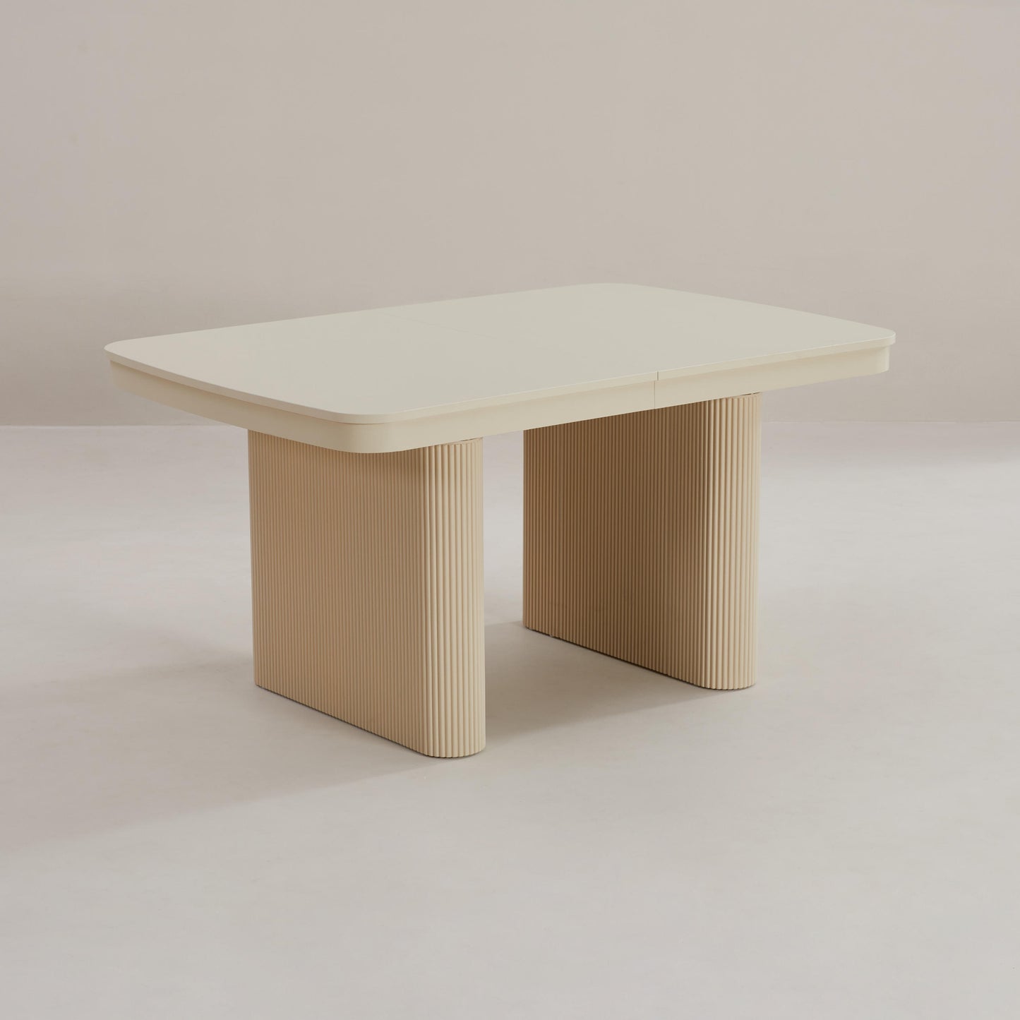 The Riveni - Curved Fluted Extending Table