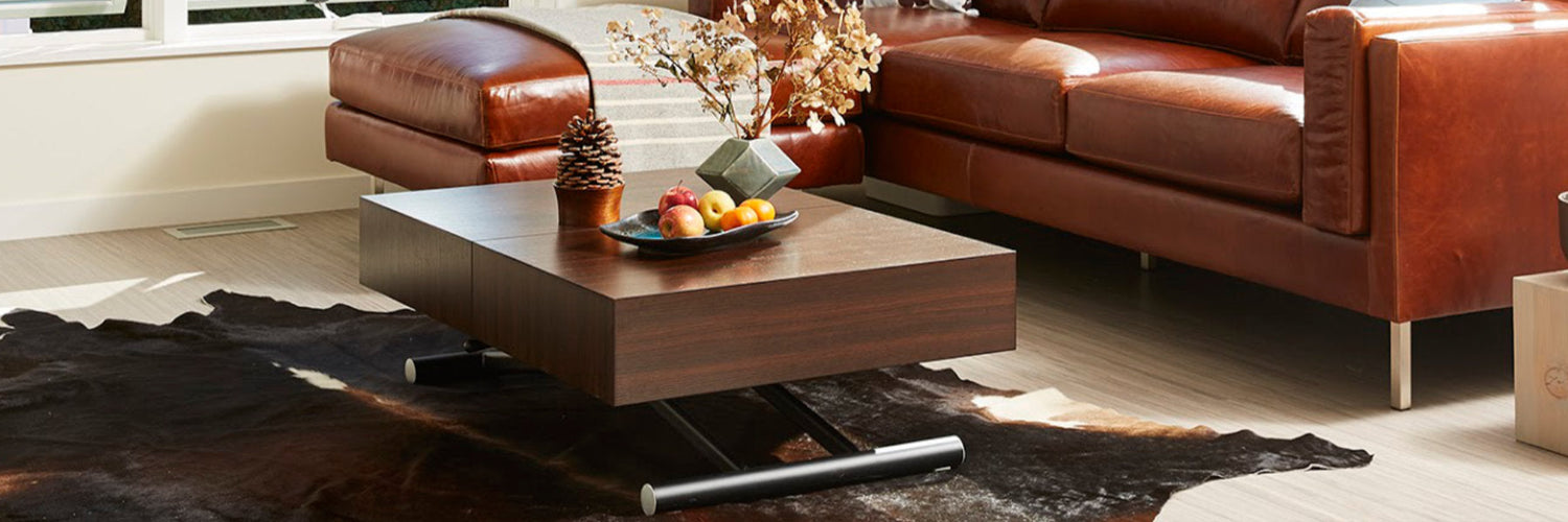 Coffee tables that transform into dining tables. Space saving, lifting top coffee tables by Expand Furniture, sold online, shipped worldwide.