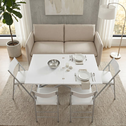 Modern dining set with white table and chairs in a living room setting. | Glossy White