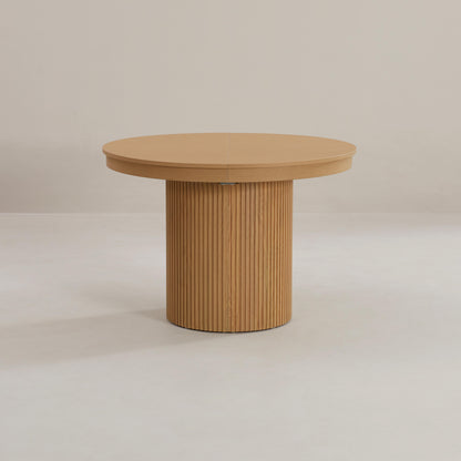Corinthian round to oval extending table 