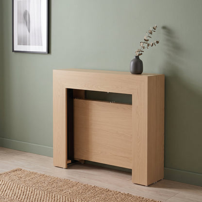 Expanda console closed against a wall but can open to 6 person dinner table set for dinner | Champagne Ash