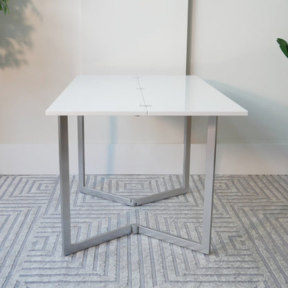 Flip-table-opened-up-with-no-decorations-ready-for-dinner-in-glossy-white