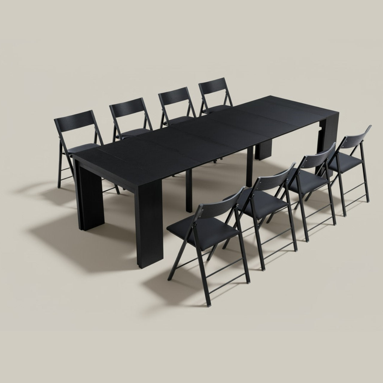 Black extending dining table with eight matching chairs on a beige background