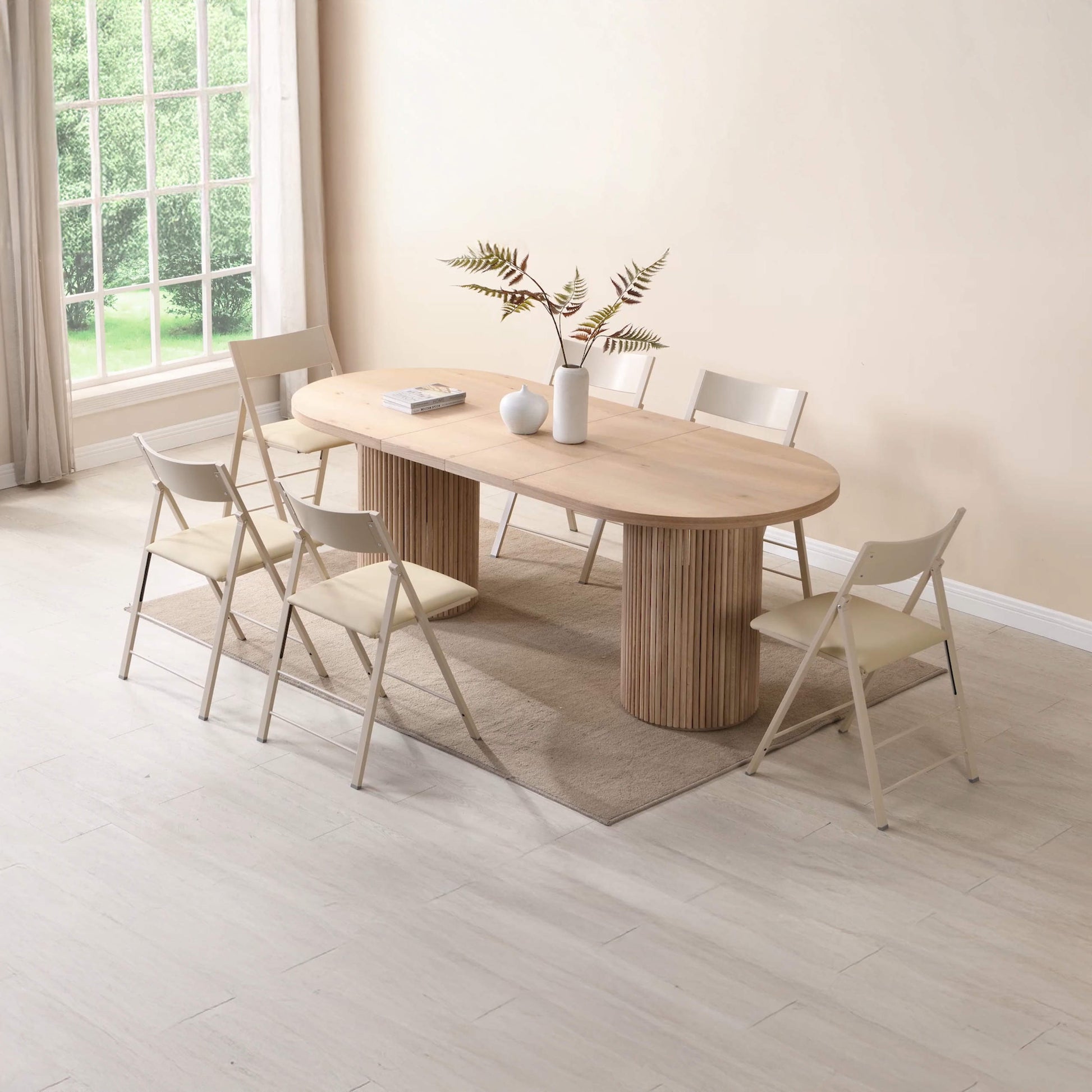 Luxe Pillar Oval Oak Extending table with fluted bases 2 extensions inserted