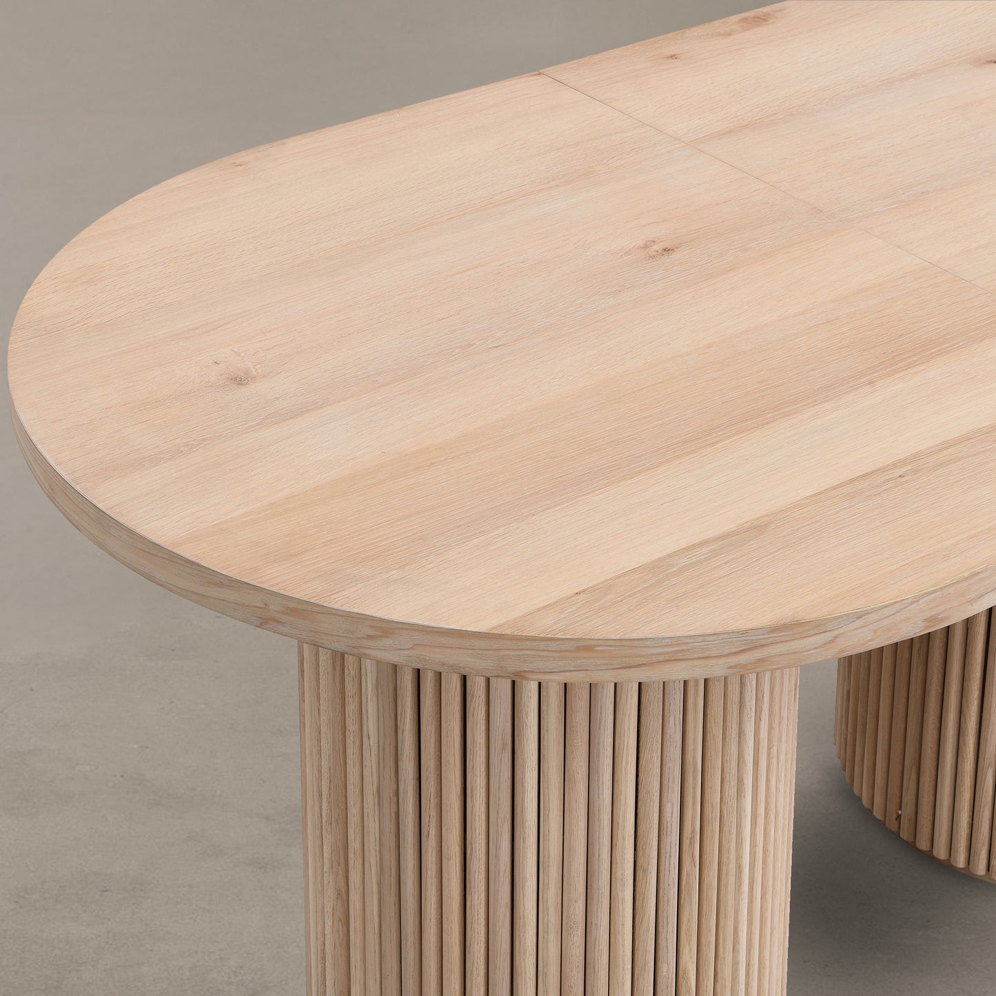 Rounded table corners and oak fluting details