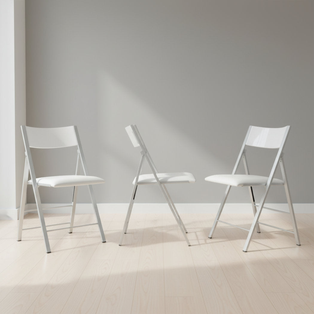 White gloss Nano folding chairs opened on display 