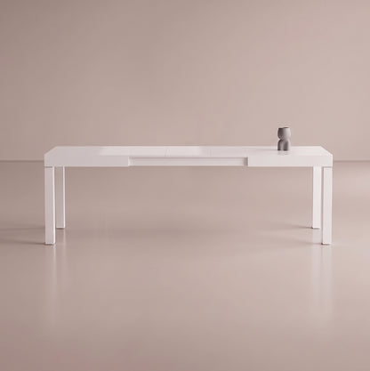Pillar table with 3 extensions inserted to for maximum kitchen dinner size - glossy white
