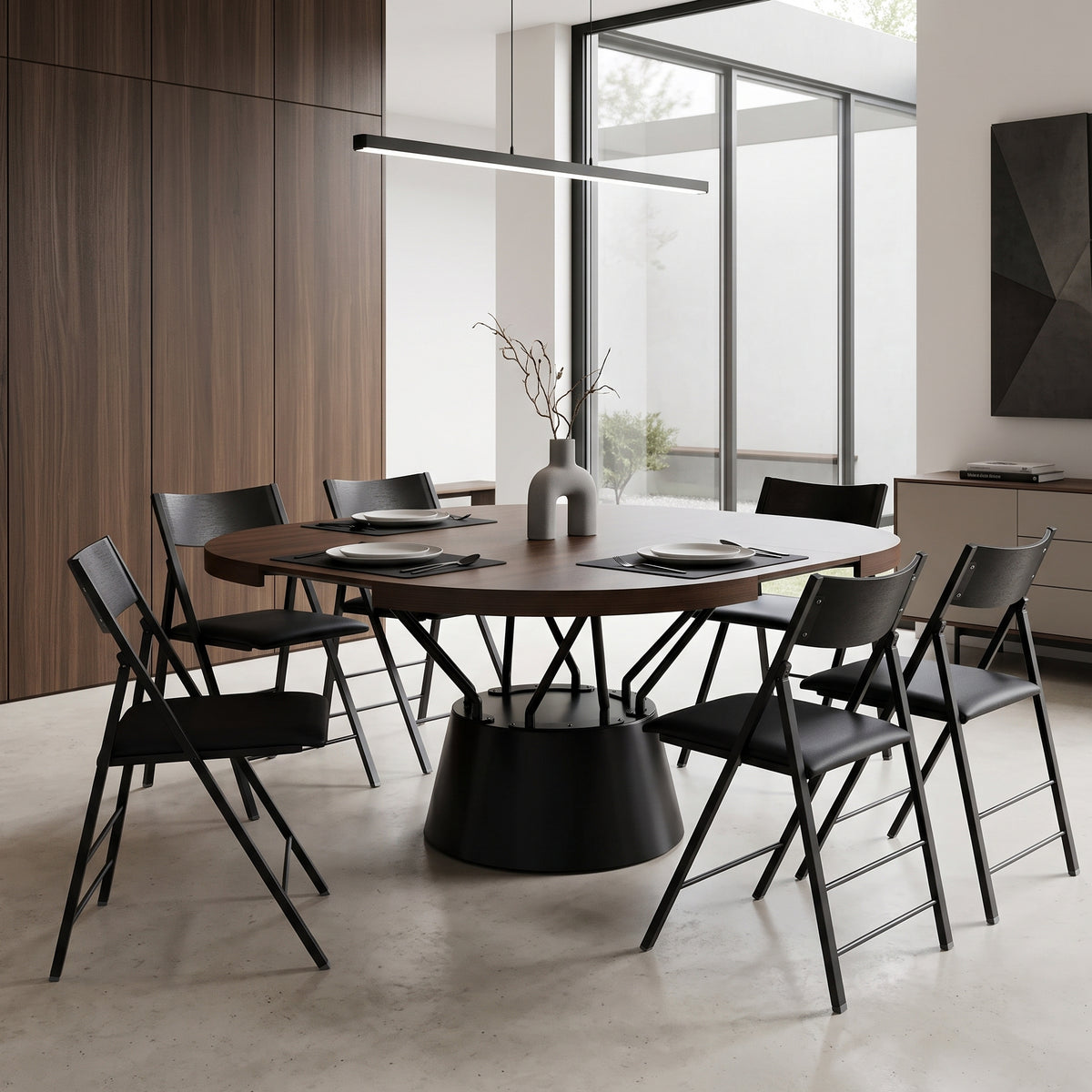 Radial round table with dual extension system opened up for dinner by Expand Furniture | Chocolate Walnut