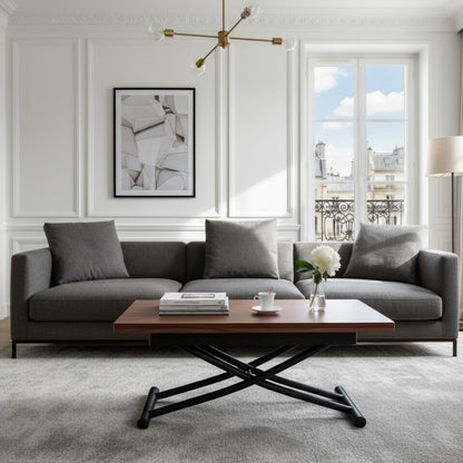 Modern living room with a gray sectional sofa, wooden transforming coffee table that doubles in size