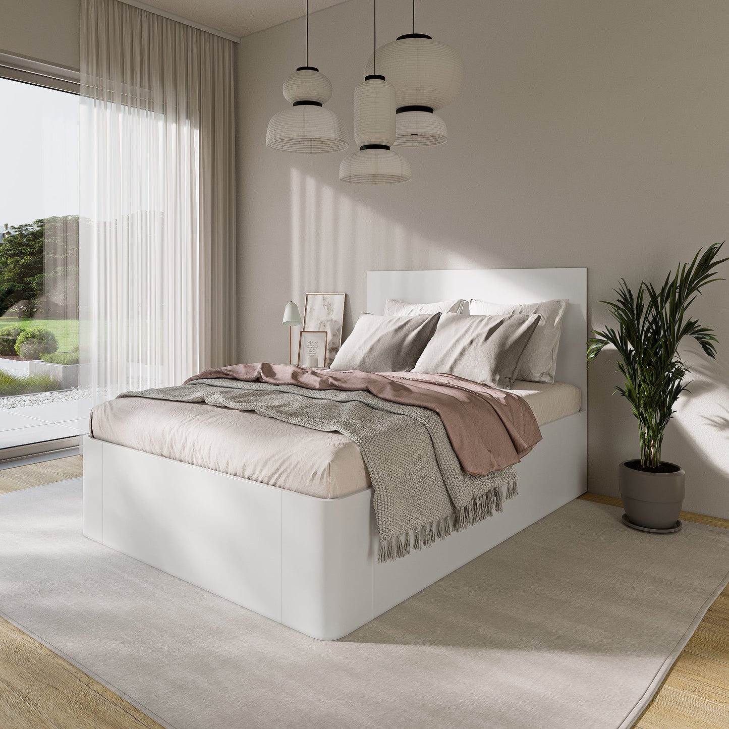 Modern bedroom with a white lift storage bed, pink blanket, and green plant.