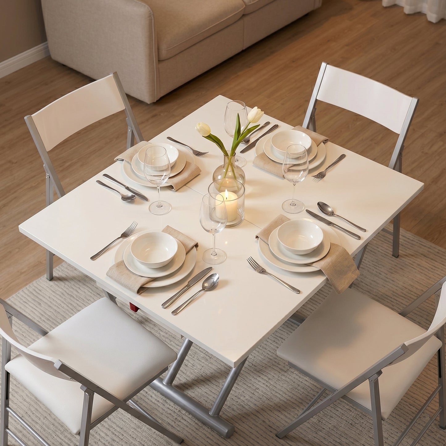 TR4 transforming coffee table moved raised and opened to seat 4 for dinner | Glossy White