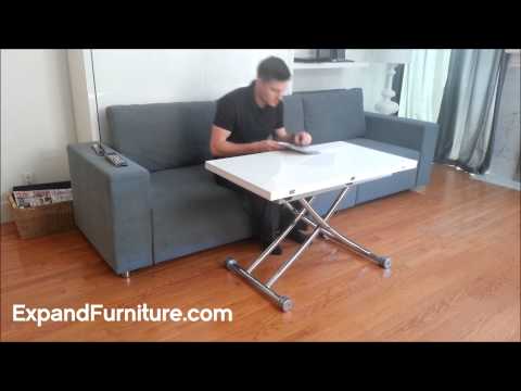Transforming apartment demo. Wall bed sofa and white gloss transforming table