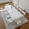 White-Gloss-Box-Coffee-table-with-10-nano-white-chairs-around-it-bright
