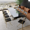 Box Coffee Table in Glass Black with Gold legs in a modern high rise - space solutions