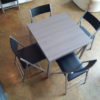 converting-Echo-Square-table-with-4-black-folding-chairs