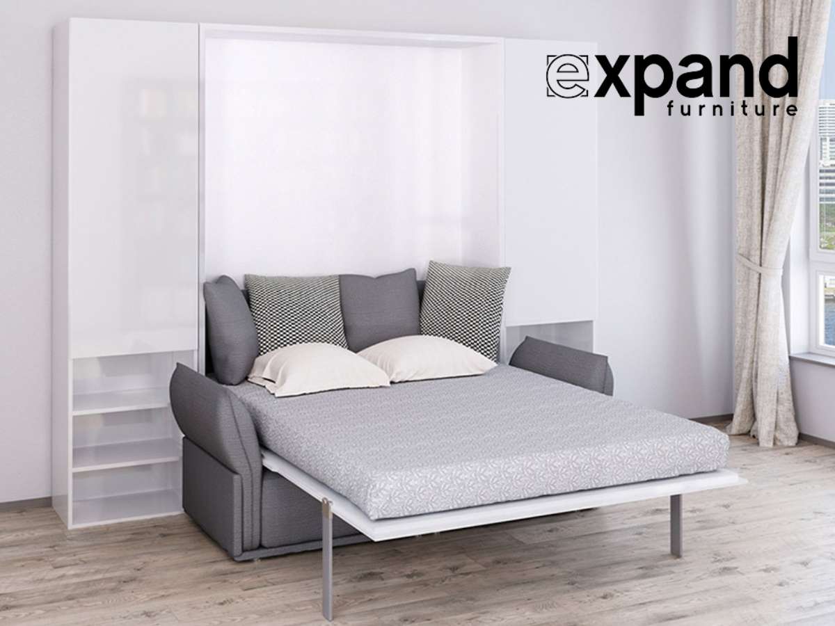 A modern wall bed in a bright room, seamlessly blending with the decor to maximize space efficiency, perfect for compact living areas